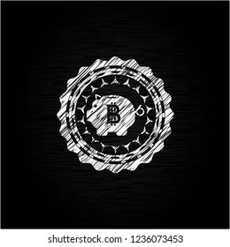 bitcoin piggy bank icon drawn on a chalkboard