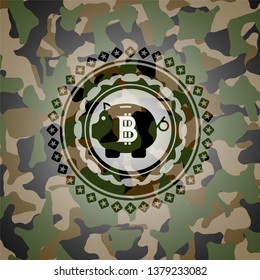 bitcoin piggy bank icon inside camouflage emblem