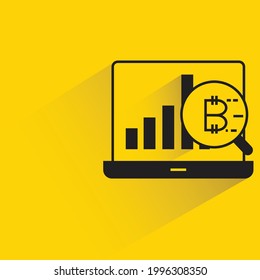 bitcoin price graph analytics on laptop icon on yellow background