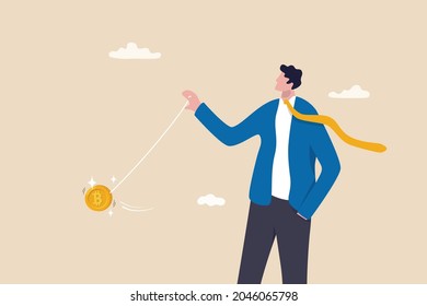 Bitcoin price swing like yoyo, crypto currency risk or volatility, trader control and manipulate price concept, smart businessman investor or trader throw bitcoin yoyo.
