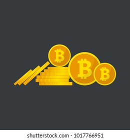 Bitcoin virtual money concept. Golden coins with bitcoin emblem.