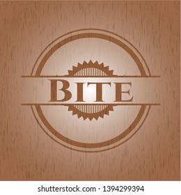 Bite retro wooden emblem. Vector Illustration.