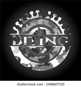 Biting grey camouflaged emblem