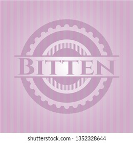 Bitten badge with pink background