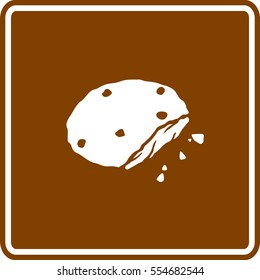 bitten chocolate chip cookie with crumbles sign