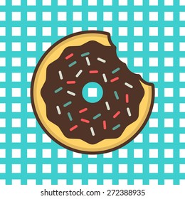 Bitten donut in a gingham table cloth