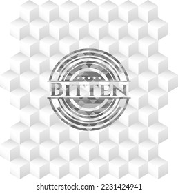 Bitten realistic grey emblem with cube white background. 