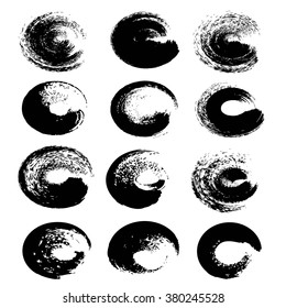 Black abstract circle textured strokes set isolated on a white background