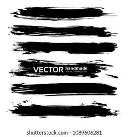 Black abstract textured long smears set isolated on a white background