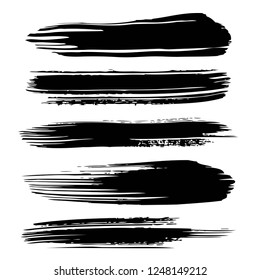 Black abstract textured long thick paint strokes isolated on white background