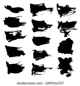 Black abstract textured smears isolated on a white background