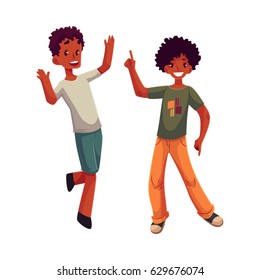 Black, African American boys, kids having fun, dancing at party, cartoon vector illustration isolated on white background. Happy black, African boys dancing, jumping at a kids, birthday party