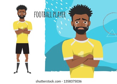 The black african american football player crossed his arms and cries. Mans tears and depression. The emotion of disappointment and sadness at the soccer player face. The male was crying