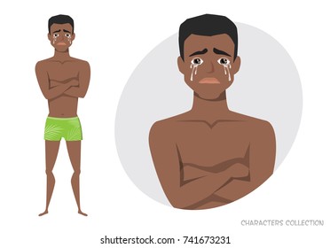 The black african american guy crossed his arms and cries.