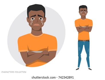The black african american guy crossed his arms and cries.