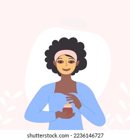 A black African-American woman is wearing a mask or cream on her face. 