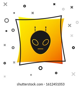 Black Alien icon isolated on white background. Extraterrestrial alien face or head symbol. Yellow square button. Vector Illustration
