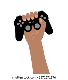 Black arm holding in high a black video games controller isolated on white. Gamer concept of victory. Gamepad with red light, buttons and joysticks.