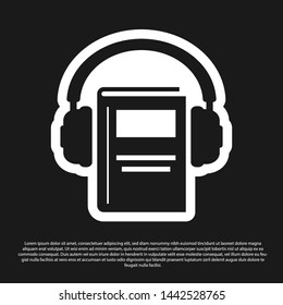 Black Audio book icon isolated on black background. Book with headphones. Audio guide sign. Online learning concept.  Vector Illustration