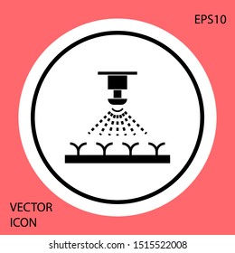 Black Automatic irrigation sprinklers icon isolated on red background. Watering equipment. Garden element. Spray gun icon. White circle button. Vector Illustration