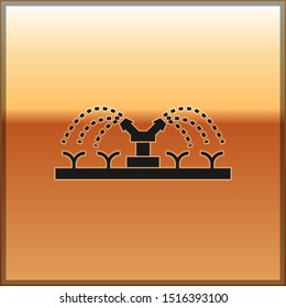 Black Automatic irrigation sprinklers icon isolated on gold background. Watering equipment. Garden element. Spray gun icon.  Vector Illustration
