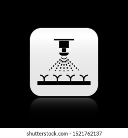 Black Automatic irrigation sprinklers icon isolated on black background. Watering equipment. Garden element. Spray gun icon. Silver square button. Vector Illustration