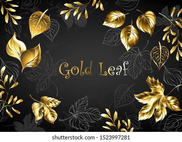 Black autumn background with golden, shiny leaves and gray, contour leaves.