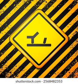 Black Baby shoes icon isolated on yellow background. Sandal sign. Warning sign. Vector