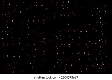Black background abstract with orange spots