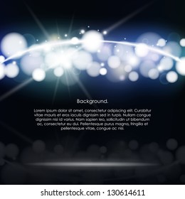 Black background with blue and white luminous rays and circles