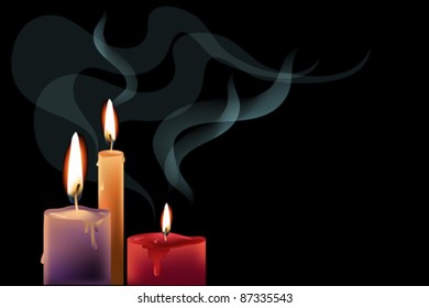 Black background with colorful candles and decorative smock.
