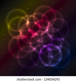 Black background with colorful circles reflecting an abstract space