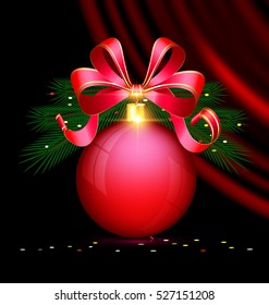 black background, dark crimson drape and the large red ball with branch of tree and bow