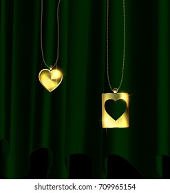 black background, dark drape and golden chain with couple of jewelry hearts