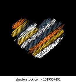 Black background with different color grunge tire track silhouettes