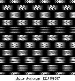 Black background with different white tire track silhouettes