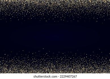 Black background with shiny gold dust.Festive background.