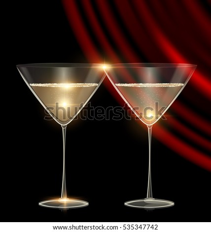 black background and two glasses of white wine with dark red drape