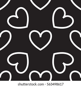 Black background with white hearts polka dots. Seamless vector pattern eps 10. Simple repeating texture. For Valentine's Day and Wedding. Gift wrap, print, fabric, textile retro fond.