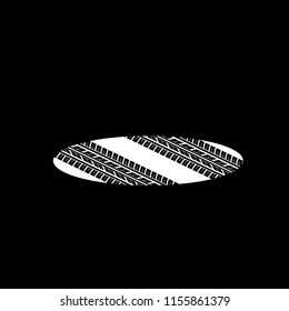 Black background with white oval and black tire tracks