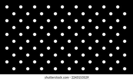black background with white polka dots