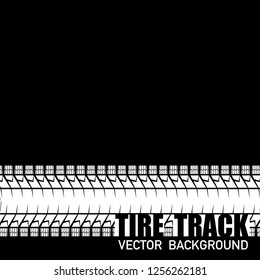 Black background with white tire track and sample text