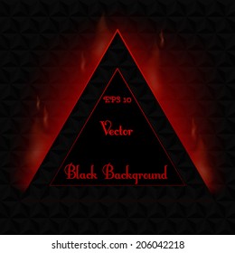 Black background.Triangle.in fire