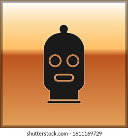 Black Balaclava icon isolated on gold background. A piece of clothing for winter sports or a mask for a criminal or a thief.  Vector Illustration