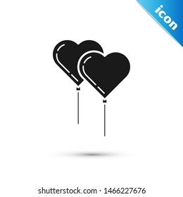 Black Balloons in form of heart with ribbon icon isolated on white background.  Vector Illustration