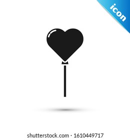 Black Balloons in form of heart with ribbon icon isolated on white background.  Vector Illustration