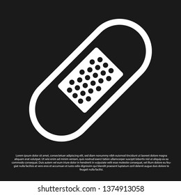Black Bandage plaster icon isolated on black background. Medical plaster, adhesive bandage, flexible fabric bandage. Vector Illustration