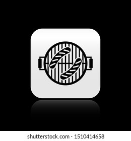 Black Barbecue grill with sausage icon isolated on black background. BBQ grill party. Silver square button. Vector Illustration