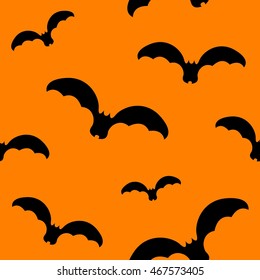 Black bat seamless pattern on orange background