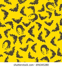 Black bats and cats seamless pattern on white background. Flat styled vector illustration. Halloween holiday symbols design